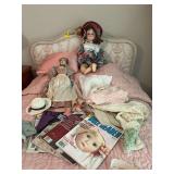Miscellaneous doll pieces and books with two dolls