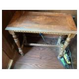 Cute detailed little antique table 24” x 12” x 21”.