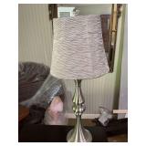 Silver lamp 7” x 29” the shade is an oval 12 inch wide