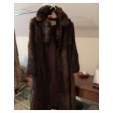 Long brown size small rabbit coat. Dino Rocco.