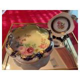 Hand-painted dresser bowl and plate. The bowl is 5 1/2” x 2”. The plate is 3 in.² squared.