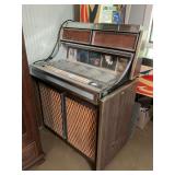Vintage Seeburg stereo-three-way audio jukebox in working condition .40“ x 24“ x 52“