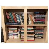 Two shelves of books as shown mixed genre