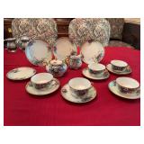 Handpainted Noritake Nippon Violet china. Three 6 1/2 inch plates one does has a chip as shown, cream and sugar bowl with six saucers and five tea cups. Signed Freibere