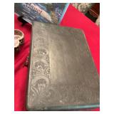 Group of home decor items, a Monet book, a filigree 4 x 4 inch clover dresser box -no lid and an ornate wooden box  12“ x 8“ x 6“ with a vintage velvet and satin jewelry presentation Van Dale bo