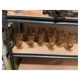 Set of 14 Fosteria Jamestown vintage amber swirl pedestal glasses