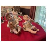 Vintage bisque boy and girl piano babies 10 inches and 8 inches
