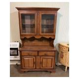 Vintage  Bassett Lighted two piece Maple Hutch/China cabinet. The base is 42“ x 18“ x 31 1/2“ the top piece is 39“x 11” x 42” contents not included