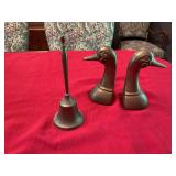 Pair of brass duck head book ends and a 8 inch brass bell