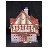 Dept. 56 Heritage Village Collection “Disney Parks Village Series - Tinker Bell’s Treasures” lighted porcelain piece in original box (box is in fair condition)