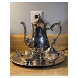 Wm. Rogers 4-piece silverplate tea set - includes tray, teapot, creamer and sugar bowl - creamer has a hairline crack