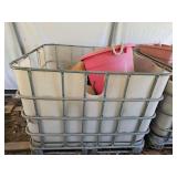 Schutz Metal IBC cage 47.5" x 39.5" x 36.5"h w/plastic liner filled with dried gourds...