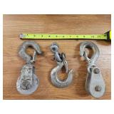 Vintage hooks; 2 have pulleys...