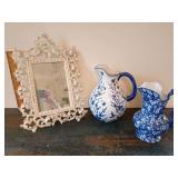 Heavy cast iron Rococo tabletop vanity mirror. Blue and white ceramic pitcher, butterflies/hummingbirds. Victoria Ware ironstone water pitcher, all-over densely packed white cherry blossom, scrolled b