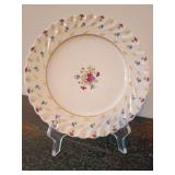 8 Haviland Limoges porcelain plate in the discontinued Lutetia pattern, swirled fluted rim with pink and blue floral and gold gilding 7.5".