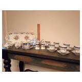 Blue and white chintz teapot. Floral Tea Cups & Saucers. Serving Pieces, sugar bowls, broken handle inside, a creamer, salt and pepper shakers,  rectangular serving tray.