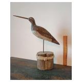 Hand-carved and painted wooden shorebird decoy.