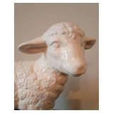 Textured white ceramic lamb figurine, 11"T x 13"L.