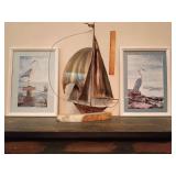 Metal sailboat sculpture, and 2 blue heron framed prints.