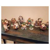 Crinkle Claus collection, created by Possible Dreams, Ltd. starting in the mid-1990s. 11 resin figurines, ranging from 2.5" to 5.5" T. Each named and numbered.