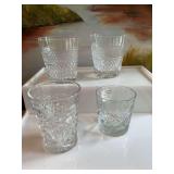 Set a four rock glasses and tumblers. The back two are Royal Doulton