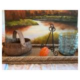 Group of decor pieces; a vintage round bottom basket-11 inches wide, a 6 inch glass pumpkin, plate rack, and a 10 inch tall bubble glass and metal basket