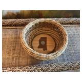 8 1/2 inch round woven wicker basket with the state of Mississippi wood bottom with a 2002 Magnolia state quarter