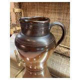 Vintage pottery pitcher in Brown tones. 7 1/2“ x 8 1/2“