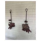 Two cast-iron rabbit hanging candle holders 27” x 9” save photos for condition