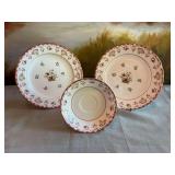 Three pieces of Wedgewood bone China-England- (2) 8 1/2 inch plates and one saucer. Bianca pattern.