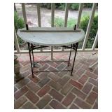White marble top table on iron base 34“ x 25“ the backsplash piece needs reattached