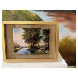 5 1/2 x 7 1/2 gold frame with an enamel floral scene