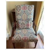 Quality antique upholstered Martha Washington style wooden armchair with matching throw pillow. Chair is 27” x 28” x 43” seat height is 18 inches.