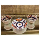 Three-piece set;  2 cups and a 5 1/2 inch bowl. The bowl has a crack as shown.