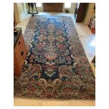 5 1/2 x 11“ Persian antique Kerman rug, hand woven in Iran. Circa 1930 to 1940s Wahl Powell and a cotton foundation. Blue background with flowers in pinks and light blues.. does show some wearing - 