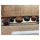 Group of wooden vase and jar display stands