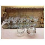 6 EAPG water goblets – Newport Bullseye and Daisy amethyst stained with an additional three different colored… and an EAPG Northwood, Cherry and cable butter dish lid and small bowl