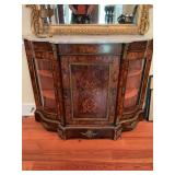 Magnificent 19 C French marble and bronze inlaid marquetry floral table with glass doors and shelving on each side.. 50“ x 16“ x 38 1/2“. Appraised at $2900.