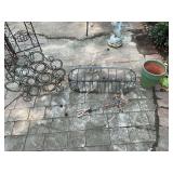 Four pieces of outdoor decor; the green painted terra-cotta pot is 9 inches, cross wind, chime as is. Two metal pieces 28 inches and 22 inches long.