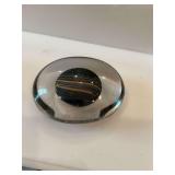 Kosta Boca paperweight. Black with orange stripes. Signed by Atelja Bertil Vallien