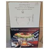 Silver plated grape design 2 quart round food warmer with serving spoon appears unused. And silver plated 2 quart pierced gallery round food warmer.