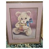Artist signed limited edition 241/1500 by artist Sandy Scruggs. "Lunch Time" features aTeddy bear with Peter Pan peanut butter jar and blue bow. 17 x 21 in tall.