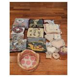 Neddlepoint, embroidery, cross stitch and tapestry decorative pillows and basket.