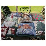 Decorative Christmas themed pillows.