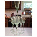 Set of 7 vintage Block Crystal "Stockholm Melody" green hand-blown water or wine goblets featuring an optic design with trapped air bubbles in the bowl.