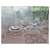 Grouping of candle holders, candle bowl, and various globes.
