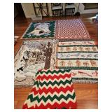 Grouping of Christmas throws.