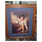 Framed print of Sir Henry Raeburn’s famous 1814 portrait painting, "Boy and Rabbit". 19.25 x 23.5 in tall.