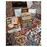 Grouping of miscellaneous items. Includes stems of cotton bols, three storage tins, magazine rack, framed prints, and more. See all photos.