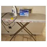 Adjustable ironing board, proctor Silex iron, and perfection compact travel iron with spray.